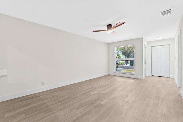 4498 NW 2nd Ave, Boca Raton, FL 33431 - spare room featuring ceiling fan, light wood finished floors, and baseboards