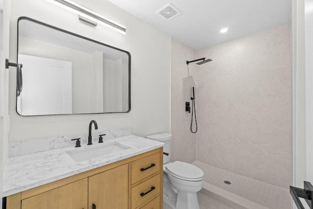 4498 NW 2nd Ave, Boca Raton, FL 33431 - bathroom featuring toilet, tiled shower, and vanity