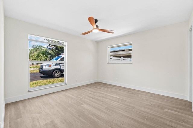 4498 NW 2nd Ave, Boca Raton, FL 33431 - spare room with plenty of natural light, light wood-style floors, and baseboards