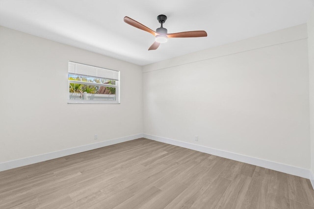 4498 NW 2nd Ave, Boca Raton, FL 33431 - empty room featuring light wood-style flooring, a ceiling fan, and baseboards