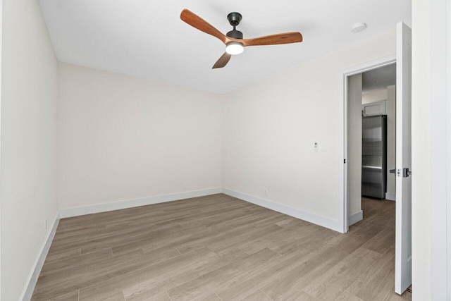 4498 NW 2nd Ave, Boca Raton, FL 33431 - unfurnished room featuring a ceiling fan, light wood-style flooring, baseboards, and a smoke detector