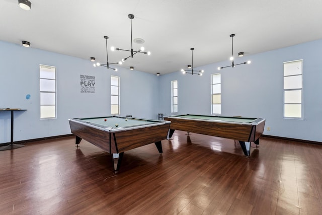 playroom featuring billiards table, wood finished floors, and plenty of natural light