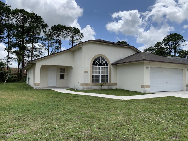 1472 SW Melrose Ave, Port Saint Lucie, FL 34953 - view of front of house featuring stucco siding, a front lawn, an attached garage, and driveway