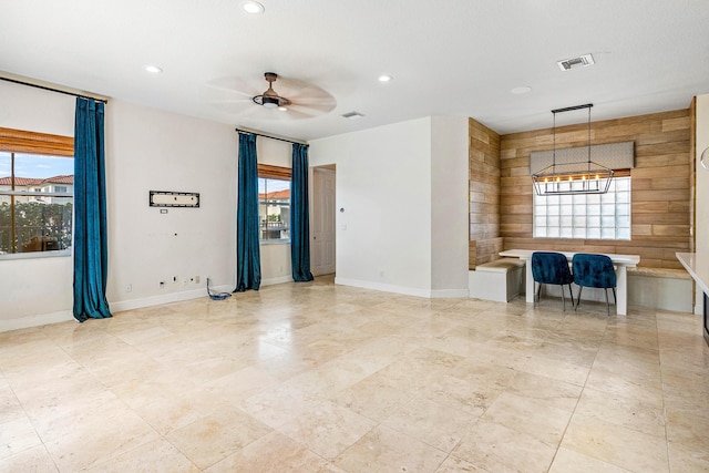 4205 Artesa Dr, Boynton Beach, FL 33436 - unfurnished room featuring baseboards, recessed lighting, ceiling fan, wooden walls, and a chandelier