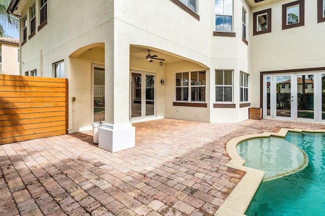 4205 Artesa Dr, Boynton Beach, FL 33436 - swimming pool with french doors, a patio, fence, and a ceiling fan
