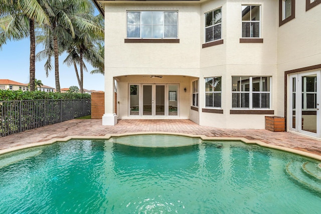 4205 Artesa Dr, Boynton Beach, FL 33436 - view of swimming pool with french doors, fence, and a patio