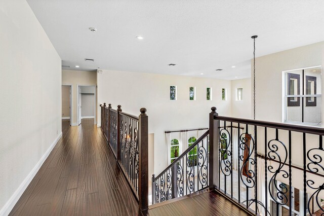 4205 Artesa Dr, Boynton Beach, FL 33436 - corridor featuring an upstairs landing, baseboards, recessed lighting, and wood finished floors
