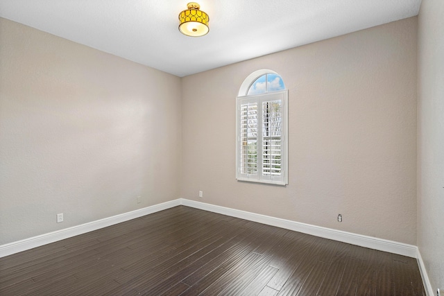 4205 Artesa Dr, Boynton Beach, FL 33436 - empty room featuring baseboards and dark wood-type flooring