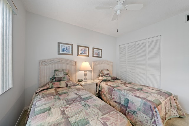 210 SE Village Dr Unit 210, Port Saint Lucie, FL 34952 - carpeted bedroom with a closet, baseboards, and ceiling fan