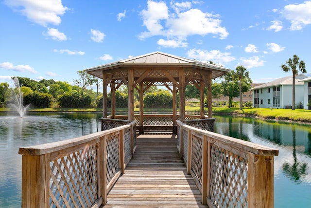210 SE Village Dr Unit 210, Port Saint Lucie, FL 34952 - dock with a gazebo and a water view