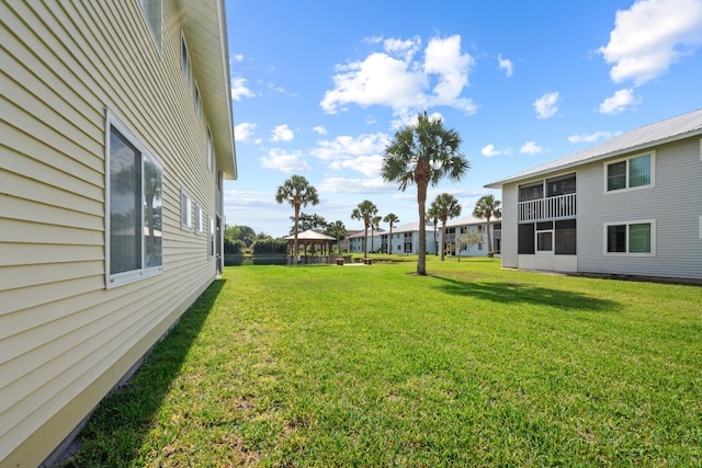 210 SE Village Dr Unit 210, Port Saint Lucie, FL 34952 - view of grassy yard
