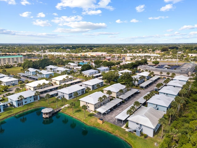 210 SE Village Dr Unit 210, Port Saint Lucie, FL 34952 - aerial perspective of suburban area featuring a pool area