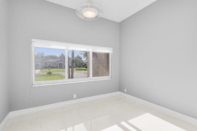 5320 SW 199th Ave, Pembroke Pines, FL 33332 - empty room with marble finish floors and baseboards