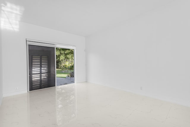 5320 SW 199th Ave, Pembroke Pines, FL 33332 - spare room featuring marble finish flooring and baseboards