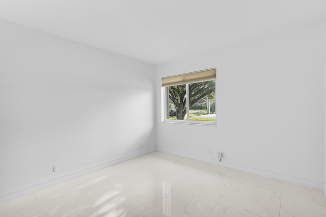 5320 SW 199th Ave, Pembroke Pines, FL 33332 - empty room with light marble finish floors and baseboards