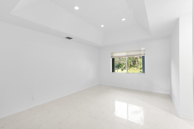 5320 SW 199th Ave, Pembroke Pines, FL 33332 - unfurnished room with a raised ceiling, recessed lighting, light marble finish floors, and baseboards