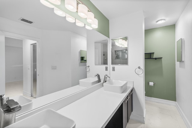5320 SW 199th Ave, Pembroke Pines, FL 33332 - full bathroom with marble finish floors, baseboards, and double vanity