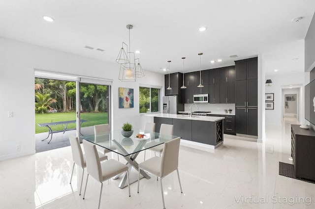 5320 SW 199th Ave, Pembroke Pines, FL 33332 - dining space with light marble finish flooring and recessed lighting