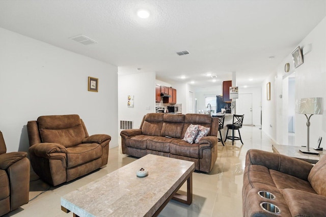 482 NW Fairfax Ave, Port Saint Lucie, FL 34983 - living room featuring recessed lighting