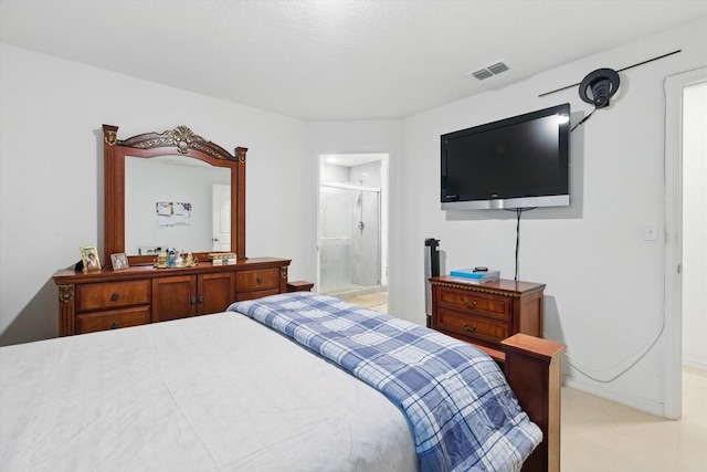 482 NW Fairfax Ave, Port Saint Lucie, FL 34983 - bedroom featuring baseboards and ensuite bathroom