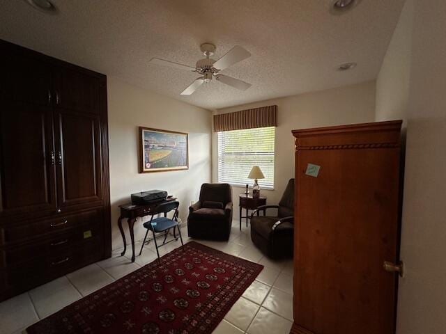 5155 Europa Dr Unit R, Boynton Beach, FL 33437 - living area featuring a ceiling fan and light tile patterned floors