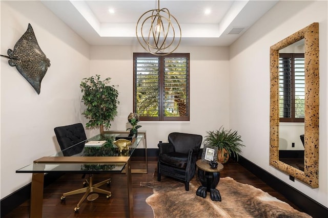 office with a raised ceiling, a chandelier, wood finished floors, and baseboards