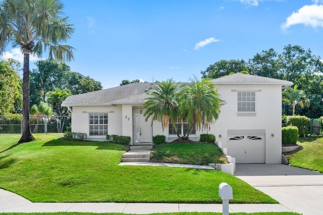 22 Pepperwood Ct, Boynton Beach, FL 33426 - view of front of house featuring stucco siding, an attached garage, and driveway