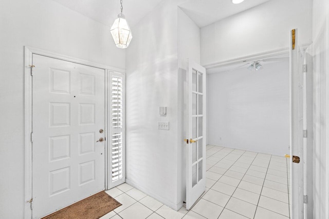 22 Pepperwood Ct, Boynton Beach, FL 33426 - foyer entrance featuring light tile patterned floors