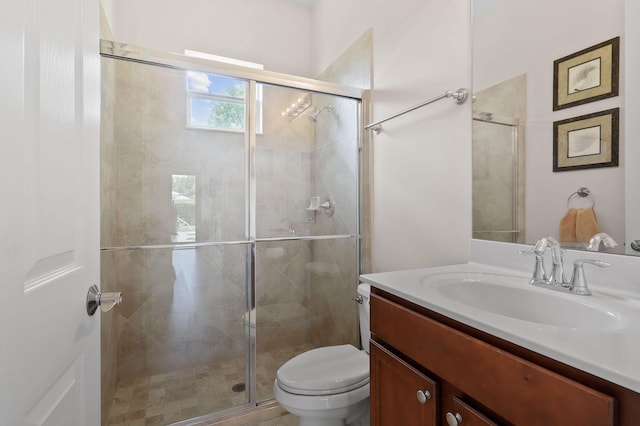 7668 SE Laque Cir, Stuart, FL 34997 - full bath with vanity, toilet, and a stall shower