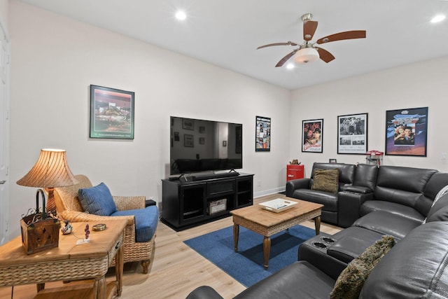 7668 SE Laque Cir, Stuart, FL 34997 - living area featuring light wood finished floors, ceiling fan, recessed lighting, and baseboards