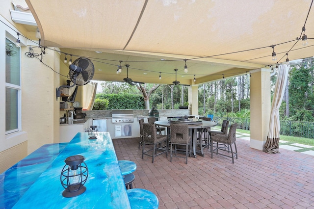 7668 SE Laque Cir, Stuart, FL 34997 - view of patio featuring outdoor dining area and ceiling fan