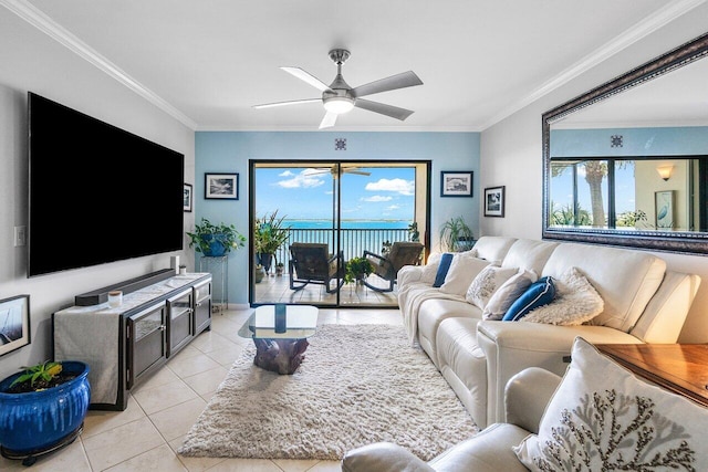 20 NE Plantation Rd Unit 203, Stuart, FL 34996 - living area with healthy amount of natural light, light tile patterned flooring, ornamental molding, ceiling fan, and a water view