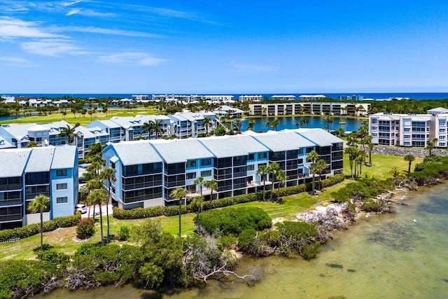 20 NE Plantation Rd Unit 203, Stuart, FL 34996 - aerial view of apartment complex and a large body of water