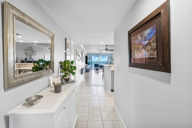 20 NE Plantation Rd Unit 203, Stuart, FL 34996 - corridor with light tile patterned flooring, recessed lighting, and baseboards