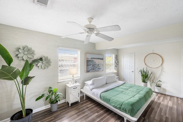 3056 SE Morningside Blvd, Port Saint Lucie, FL 34952 - bedroom featuring baseboards, wood finished floors, a textured ceiling, and ceiling fan