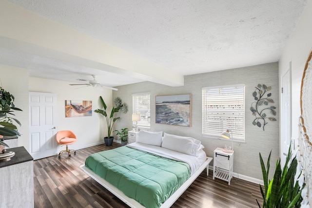 3056 SE Morningside Blvd, Port Saint Lucie, FL 34952 - bedroom featuring baseboards, a textured ceiling, wood finished floors, and multiple windows