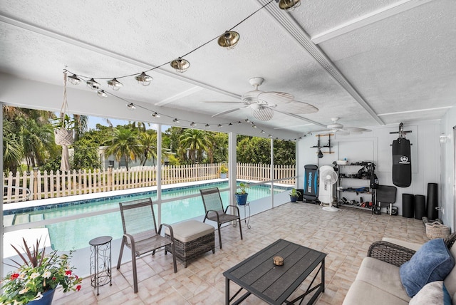 3056 SE Morningside Blvd, Port Saint Lucie, FL 34952 - view of swimming pool with a fenced backyard, ceiling fan, and a patio area