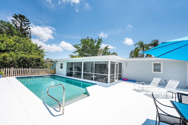 3056 SE Morningside Blvd, Port Saint Lucie, FL 34952 - view of pool featuring a sunroom and a patio