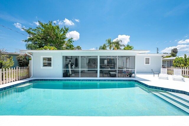 3056 SE Morningside Blvd, Port Saint Lucie, FL 34952 - view of pool featuring a sunroom and a patio