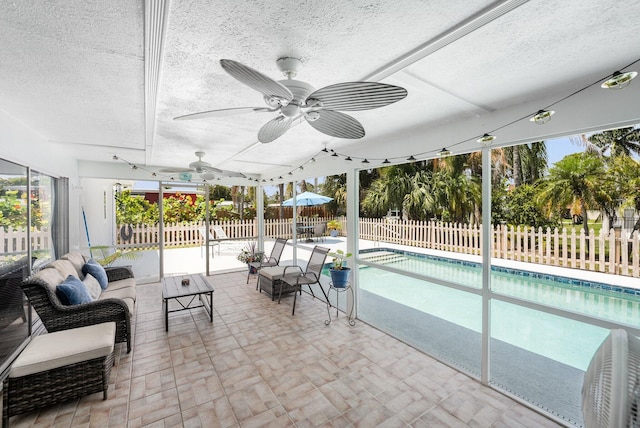 3056 SE Morningside Blvd, Port Saint Lucie, FL 34952 - view of pool with a fenced backyard, a ceiling fan, and a patio area