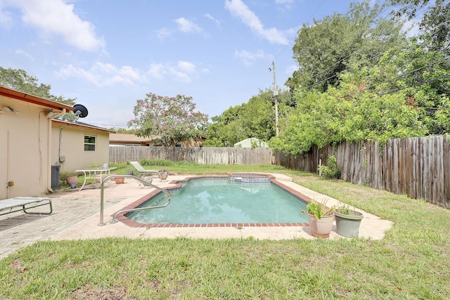 view of swimming pool with a patio and an in-ground hot tub