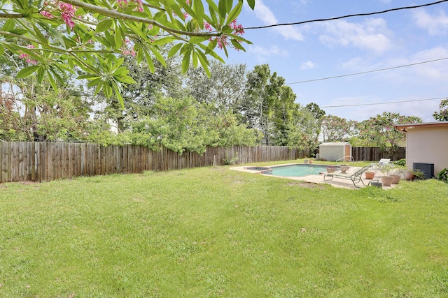 view of yard with a shed and an outbuilding