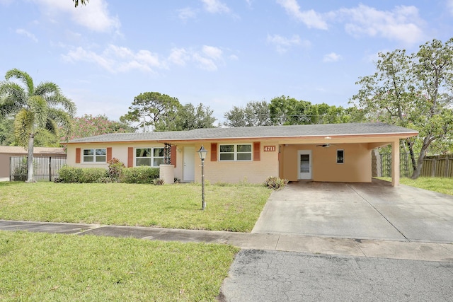 single story home featuring concrete driveway, a carport, and stucco siding