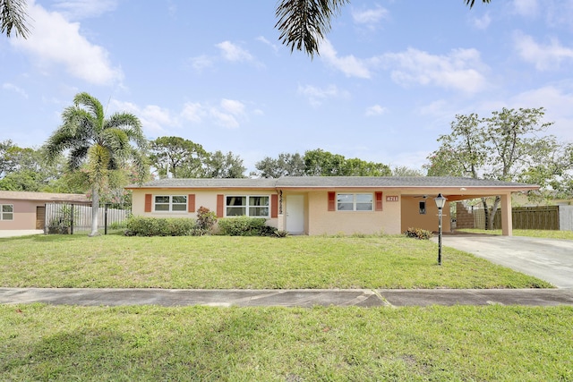 ranch-style house with concrete driveway, a carport, and brick siding