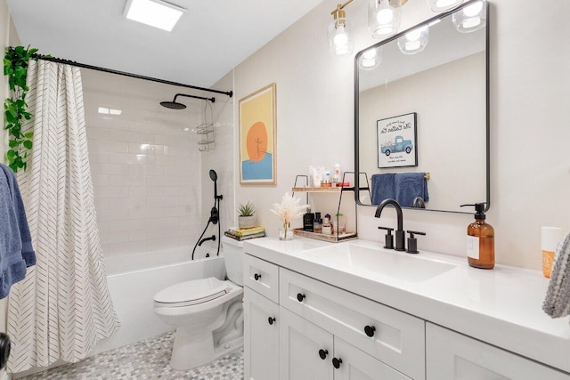 full bathroom featuring toilet, vanity, and shower / tub combo
