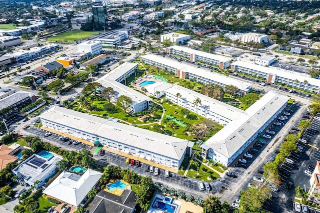 aerial view of property's location with a pool area