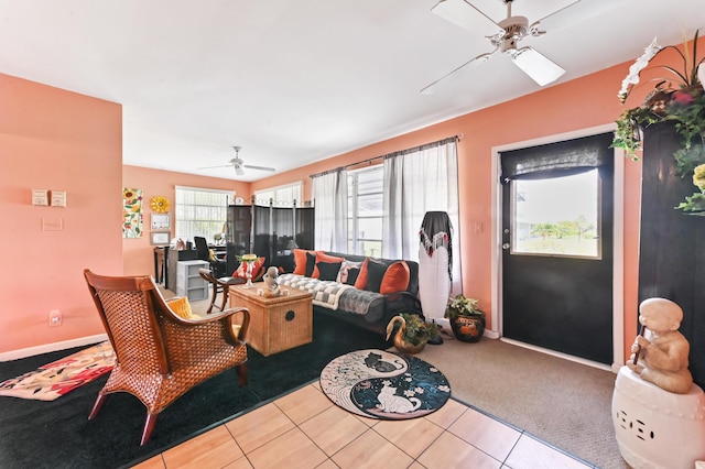 103 SW 18th St, Boynton Beach, FL 33426 - carpeted living area featuring ceiling fan, tile patterned flooring, and baseboards