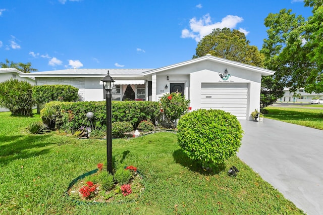 103 SW 18th St, Boynton Beach, FL 33426 - single story home featuring driveway, a front yard, an attached garage, and stucco siding