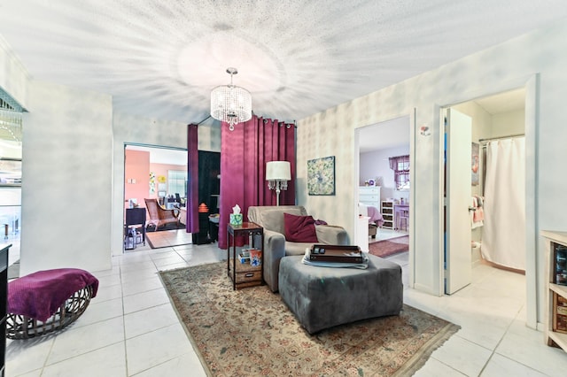 103 SW 18th St, Boynton Beach, FL 33426 - living room with tile patterned flooring and a chandelier