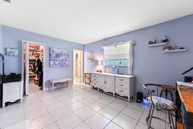 103 SW 18th St, Boynton Beach, FL 33426 - bathroom with tile patterned flooring and a textured ceiling